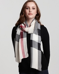 In soft, sheer silk, Burberry's Core Creppone check scarf lends a smooth finish. In soft, sheer silk, Burberry's Core Creppone check scarf lends a smooth finish.