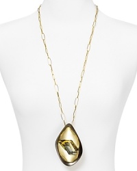 This Alexis Bittar necklace brings sculptural sparkle to your look, accented by a shapely gold plated pendant. This Alexis Bittar necklace brings sculptural sparkle to your look, accented by a shapely gold plated pendant.