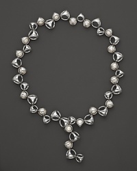 This bold sterling silver necklace, gleaming with freshwater pearls, is a brilliant showcase for Di MODOLO's iconic Triadra design. This bold sterling silver necklace, gleaming with freshwater pearls, is a brilliant showcase for Di MODOLO's iconic Triadra design.