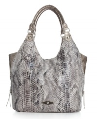 A chic bucket tote with high-shine hardware that easiy transitions from day into night. Shiny silvertone accents and a take-anywhere silhouette give this Elliott Lucca design year-round appeal. A chic bucket tote with high-shine hardware that easiy transitions from day into night. Shiny silvertone accents and a take-anywhere silhouette give this Elliott Lucca design year-round appeal.