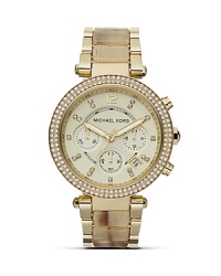 An elegant choice on duty or off. This gold-plated watch from MICHAEL Michael Kors boasts a boldly sized face, acetate bracelet and glitzy, crystal accents. An elegant choice on duty or off. This gold-plated watch from MICHAEL Michael Kors boasts a boldly sized face, acetate bracelet and glitzy, crystal accents.
