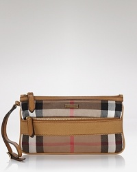 Perfect the day-to-night downsize with this checked accessory from Burberry. It boasts the brand's classic print, yet in a wrist-friendly shape that's wholly modern. Perfect the day-to-night downsize with this checked accessory from Burberry. It boasts the brand's classic print, yet in a wrist-friendly shape that's wholly modern.