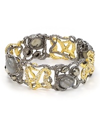 A richly crafted statement: Glistening labradorite, pyrite and Swarovski crystal stones rise from woven two-tone metals. From Alexis Bittar. A richly crafted statement: Glistening labradorite, pyrite and Swarovski crystal stones rise from woven two-tone metals. From Alexis Bittar.