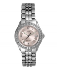 Textured details and glitz bezel add glamour to a classic watch style by GUESS.