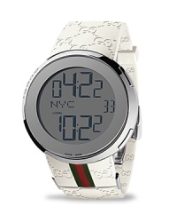 From the I-Gucci collection, a modern timepiece. Silver dial offers the option of a digital or analog display. Blue digits represent hour, minute, second, date and your location. White rubber strap with red/green webbing accent. Triple deployment buckle. From the I-Gucci collection, a modern timepiece. Silver dial offers the option of a digital or analog display. Blue digits represent hour, minute, second, date and your location. White rubber strap with red/green webbing accent. Triple deployment buckle.
