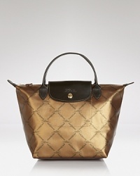 The epitome of laid back luxe. Longchamp's signature satchel is have-now and wear-forever closet essential, updated in a striking metallic finish. The epitome of laid back luxe. Longchamp's signature satchel is have-now and wear-forever closet essential, updated in a striking metallic finish.