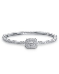 From the Colvmbvs collection, a white gold rectangle bangle with round and princess-cut diamond accents. Designed by Charriol. From the Colvmbvs collection, a white gold rectangle bangle with round and princess-cut diamond accents. Designed by Charriol.