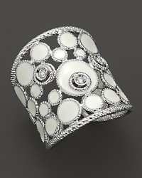 Diamonds set in enamel and 18K. white gold. Diamonds set in enamel and 18K. white gold.