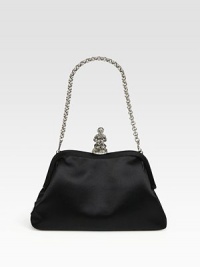 Satin frame-top silhouette with a signature monkey-clasp closure.Chain strap, 8 dropTop clasp closureOne inside zip pocketOne inside open pocketSatin lining10¾W X 6¼H X 2½DMade in Italy Satin frame-top silhouette with a signature monkey-clasp closure.Chain strap, 8 dropTop clasp closureOne inside zip pocketOne inside open pocketSatin lining10¾W X 6¼H X 2½DMade in Italy