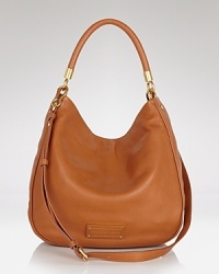 MARC BY MARC JACOBS' lush leather hobo is daytime ready. Boasting a chic shape and ample square footage, this bag is designed to handle the essentials, plus loads more. MARC BY MARC JACOBS' lush leather hobo is daytime ready. Boasting a chic shape and ample square footage, this bag is designed to handle the essentials, plus loads more.