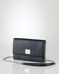 Give in to compact cravings with Lauren Ralph Lauren's leather crossbody. Sized to stow the essentials, this bag slips over a range of looks, adding a minimalist edge. Give in to compact cravings with Lauren Ralph Lauren's leather crossbody. Sized to stow the essentials, this bag slips over a range of looks, adding a minimalist edge.