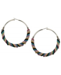 Twist the night away in these colorful hoop earrings from GUESS. A classic silhouette is upgraded with twisted chain detail in colors of the rainbow. Crafted in silver tone mixed metal. Approximate drop: 2-1/4 inches. Approximate diameter: 2 inches. Twist the night away in these colorful hoop earrings from GUESS. A classic silhouette is upgraded with twisted chain detail in colors of the rainbow. Crafted in silver tone mixed metal. Approximate drop: 2-1/4 inches. Approximate diameter: 2 inches.