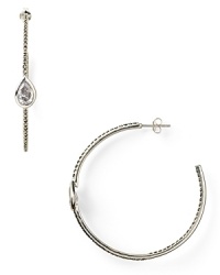 Judith Jack's latest chic earrings are at home in the boardroom or the ballroom. This crystal-encrusted cubic zirconia pair feature multifaceted teardrop stones that reflect the light. Judith Jack's latest chic earrings are at home in the boardroom or the ballroom. This crystal-encrusted cubic zirconia pair feature multifaceted teardrop stones that reflect the light.