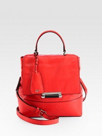 A structured classic in buttery leather, with a logo-detailed luggage tag and versatile shoulder strap. Adjustable detachable shoulder strap, 19-21½ dropTop handle, 4½ dropPush-lock closure on front flapOne back zip pocketProtective metal feetOne inside zip pocketThree inside open pocketsFully lined10W X 11½H X 4¾DImported A structured classic in buttery leather, with a logo-detailed luggage tag and versatile shoulder strap. Adjustable detachable shoulder strap, 19-21½ dropTop handle, 4½ dropPush-lock closure on front flapOne back zip pocketProtective metal feetOne inside zip pocketThree inside open pocketsFully lined10W X 11½H X 4¾DImported