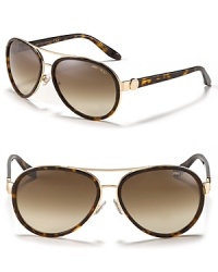 Jimmy Choo's new take on the classic aviator with double frame detail. Jimmy Choo's new take on the classic aviator with double frame detail.