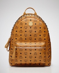 Backpacks are the cool-kid accessory du jour, and MCM's canvas version is a perfect take. Ideal for trips or running errands, this bold bag makes a practical style statement. Backpacks are the cool-kid accessory du jour, and MCM's canvas version is a perfect take. Ideal for trips or running errands, this bold bag makes a practical style statement.