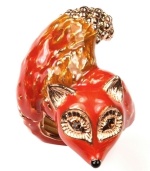 Foxy and fashionable! RACHEL Rachel Roy's stretch cocktail ring features an eye-catching fox design. Crafted in rose gold tone mixed metal, it's embellished with glittering glass accents. Ring adjusts to fit finger.