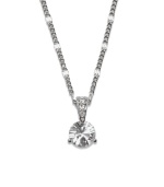 Capture a look of sparkle and simplicity. This elegant necklace by Swarovski is perfect for any occasion with its round-cut solitaire crystal design accented by a crystal-coated bail. Setting and chain crafted in silver tone mixed metal. Approximate length: 18 inches. Approximate drop: 3/4 inch.