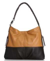 Effortlessly chic from the elegant silhouette to the front pleat and the rich colors, Tignanello's latest hobo bag has this season's hottest trends All Wrapped Up. Effortlessly chic from the elegant silhouette to the front pleat and the rich colors, Tignanello's latest hobo bag has this season's hottest trends All Wrapped Up.