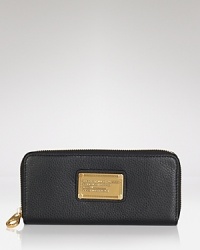 Give the gift of MARC BY MARC JACOBS. For the fashion hound, the label's pebbled leather wallet is an uncommonly chic spot to stow cash, cards and cents. Give the gift of MARC BY MARC JACOBS. For the fashion hound, the label's pebbled leather wallet is an uncommonly chic spot to stow cash, cards and cents.