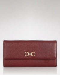 Salvatore Ferragamo's ever-chic wallet gets prettier in textured leather. Ten credit card pockets add practicality, while the brand's signature hardware is a luxurious touch. Salvatore Ferragamo's ever-chic wallet gets prettier in textured leather. Ten credit card pockets add practicality, while the brand's signature hardware is a luxurious touch.