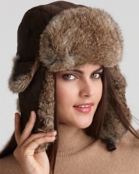 Surrell's stylish quilted aviator hat features dyed fur ears and a flip-up brim. Surrell's stylish quilted aviator hat features dyed fur ears and a flip-up brim.