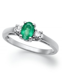 Enviable green hues. This vibrant 14k white gold ring features an oval-cut emerald (3/8 ct. t.w.) and round-cut diamond side stones (1/8 ct. t.w.). Enviable green hues. This vibrant 14k white gold ring features an oval-cut emerald (3/8 ct. t.w.) and round-cut diamond side stones (1/8 ct. t.w.).