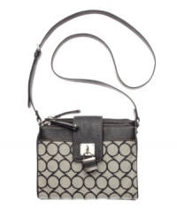 Although detailed with a classic 9 signature print, this crossbody from Nine West is a definite 10. An ultra organizational interior and polished silvertone hardware provide the perfect balance of fashion and function for an off-the-charts style. Although detailed with a classic 9 signature print, this crossbody from Nine West is a definite 10. An ultra organizational interior and polished silvertone hardware provide the perfect balance of fashion and function for an off-the-charts style.