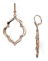 Rose gold plate is twisted into a chic jewel box statement on this pair of T Tahari drop earrings, which are an easy and pretty way to add subtle sparkle to any ensemble. Rose gold plate is twisted into a chic jewel box statement on this pair of T Tahari drop earrings, which are an easy and pretty way to add subtle sparkle to any ensemble.