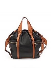 THE LOOKLambskin body with contrast cowhide trimContrast leather double top handlesAdjustable contrast shoulder strapContrast logo ID tagMagnetic top closureInterior drawstring topTwo outside open pockets with zip compartmentsProtective metal feetOne inside zip pocketTwo inside open pocketsInside logo detailTHE MEASUREMENTDouble top handles, 6Adjustable shoulder strap THE LOOKLambskin body with contrast cowhide trimContrast leather double top handlesAdjustable contrast shoulder strapContrast logo ID tagMagnetic top closureInterior drawstring topTwo outside open pockets with zip compartmentsProtective metal feetOne inside zip pocketTwo inside open pocketsInside logo detailTHE MEASUREMENTDouble top handles, 6Adjustable shoulder strap