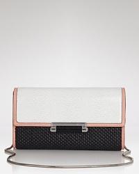 Irreverently refined, this DIANE von FURSTENBERG clutch presents a coolly textured counterpoint to a cool-girl's night out uniform, styled in embossed leather and raffia. Irreverently refined, this DIANE von FURSTENBERG clutch presents a coolly textured counterpoint to a cool-girl's night out uniform, styled in embossed leather and raffia.
