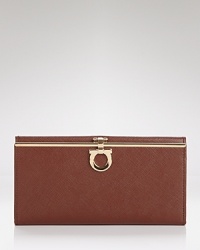Pulled together perfection starts with practical accessories like this leather wallet from Salvatore Ferragamo. It's a beautiful accompaniment for every look with plenty of pockets to keep the essentials in place. Pulled together perfection starts with practical accessories like this leather wallet from Salvatore Ferragamo. It's a beautiful accompaniment for every look with plenty of pockets to keep the essentials in place.
