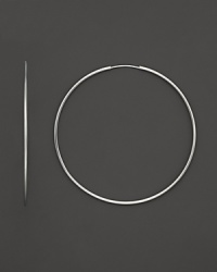 Slim, classic hoops in white gold. Slim, classic hoops in white gold.