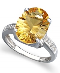 A bold burst of sunshine. Brighten any day when you don the warm tones of this oval-cut citrine ring (5-1/6 ct. t.w.). Round-cut diamond accents and a 14k white gold band add to the elegance. A bold burst of sunshine. Brighten any day when you don the warm tones of this oval-cut citrine ring (5-1/6 ct. t.w.). Round-cut diamond accents and a 14k white gold band add to the elegance.