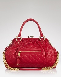 Marc Jacobs remixes the classic satchel, styled in quilted leather with glinting trims. A distinctive pushlock closure details the top, which opens to a lined interior with 2 pockets. Marc Jacobs remixes the classic satchel, styled in quilted leather with glinting trims. A distinctive pushlock closure details the top, which opens to a lined interior with 2 pockets.