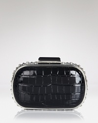 At night, we're trading tame accessories for bold styles, like this spiked clutch from BCBGMAXAZRIA. It's a perfect punk-chic punctuation mark. At night, we're trading tame accessories for bold styles, like this spiked clutch from BCBGMAXAZRIA. It's a perfect punk-chic punctuation mark.