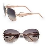 A chic style with animal appeal and acetate temples. Available in rose gold/pearl beige with smoke/beige gradient lens. Logo end-pieces100% UV protectionMade in Italy 
