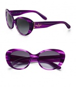 Retro-inspired acetate frames in playful prints and chic, wide temples. Available in black-cream with grey gradient lens or purple with grey gradient lens. Logo temples100% UV protectionImported