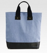 Canvas pairs with rich leather in this roomy top-handle carryall. Cotton double top handles, 3½ dropOne inside pocketFully lined13W X 15H X 3½DImported