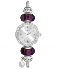 Pretty purple beads and crystal charms make this bangle watch from Caravelle by Bulova a darling choice for everyday wear. Pretty purple beads and crystal charms make this bangle watch from Caravelle by Bulova a darling choice for everyday wear.