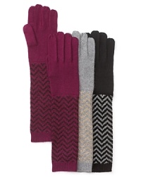 With woven metallic threads, Aqua's long, zig-zag gloves add sparkly flair to any cold weather ensemble. With woven metallic threads, Aqua's long, zig-zag gloves add sparkly flair to any cold weather ensemble.