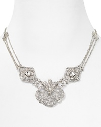 The statement necklace hits its stride this season, and this ornate style from Carolee works the look with a Deco-inspired flair that is anything but overdone. The statement necklace hits its stride this season, and this ornate style from Carolee works the look with a Deco-inspired flair that is anything but overdone.