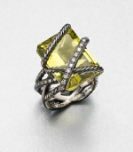 From the Cable Wrap Collection. A stunning emerald-cut lemon citrine stone wrapped in darkened sterling silver and accented with dazzling diamonds. Lemon citrineDiamonds, .48 tcwDarkened sterling silverWidth, about .78Imported