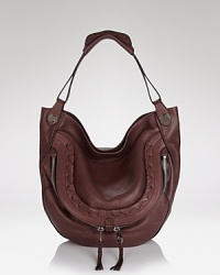 Perfect proportions cast in rich leather. Oryany's hobo is the accessory ideal for the on-the-go girl, with ample pockets and room to carry it all. Perfect proportions cast in rich leather. Oryany's hobo is the accessory ideal for the on-the-go girl, with ample pockets and room to carry it all.
