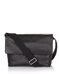 Flap messenger bag with logo patch on flap. Adjustable strap. Adjustable snap closure on flap. Front slip pocket and zip pocket inside. Flap messenger bag with logo patch on flap. Adjustable strap. Adjustable snap closure on flap. Front slip pocket and zip pocket inside.