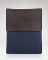 Classic luxury easily goes hand in hand with precious devices--stow fragile electronics in iconic Burberry style with this sleek and simple tablet sleeve. Classic luxury easily goes hand in hand with precious devices--stow fragile electronics in iconic Burberry style with this sleek and simple tablet sleeve.