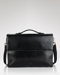 A sleek, modern briefcase with front flap and magnetic hook closure, top handle and logo embossed on front. A sleek, modern briefcase with front flap and magnetic hook closure, top handle and logo embossed on front.