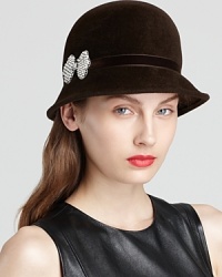 Done up in soft velour, this '20s-inspired cloche from Kathy Jeanne makes a classy statement with its removable crystal-and-pearl pin. Done up in soft velour, this '20s-inspired cloche from Kathy Jeanne makes a classy statement with its removable crystal-and-pearl pin.