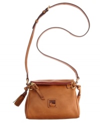 Keep your look classic with this timeless Dooney & Bourke crossbody. An iconic front emblem and refined tassel embodies the designer's quintessential style and grace. Keep your look classic with this timeless Dooney & Bourke crossbody. An iconic front emblem and refined tassel embodies the designer's quintessential style and grace.