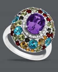 Spice up your accessory collection with Town & Country's bold cluster ring. Set in sterling silver, this oval-shaped statement ring includes amethyst (1-5/8 ct. t.w.), blue topaz (1/5 ct. t.w.), and citrine (1/8 ct. t.w.), with rhodolite garnet, smokey quartz, and peridot accents. Size 7.
